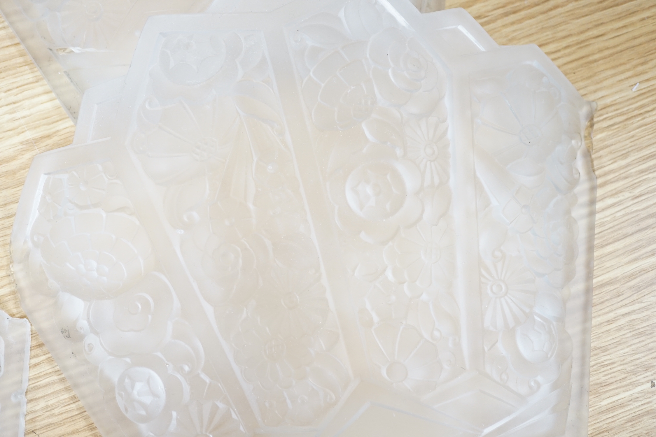 A French opaque panelled glass hanging ceiling light decorated with flowers, 25cm high excluding the fitting